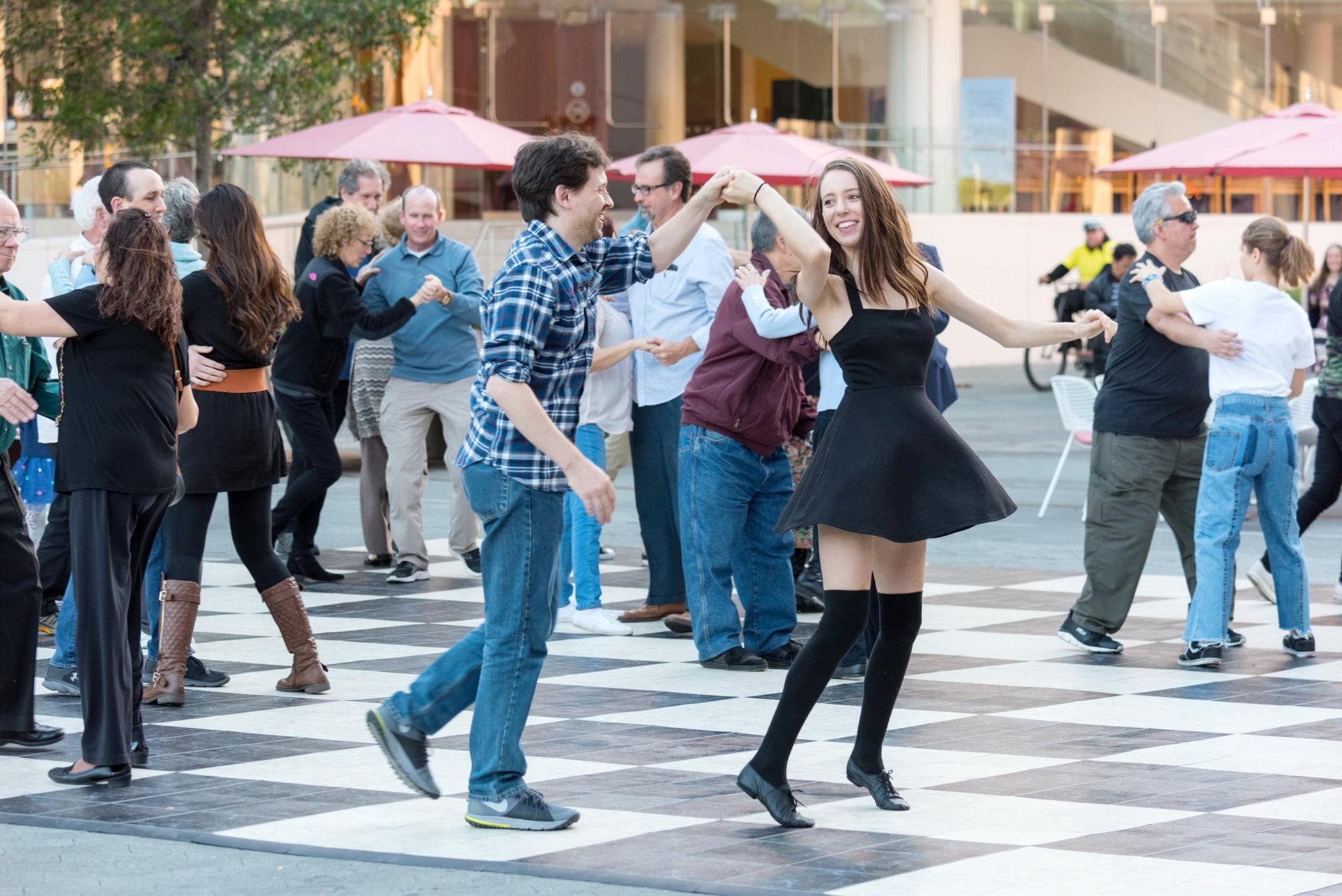 Swing dancing on Julianne and George Argyros Plaza